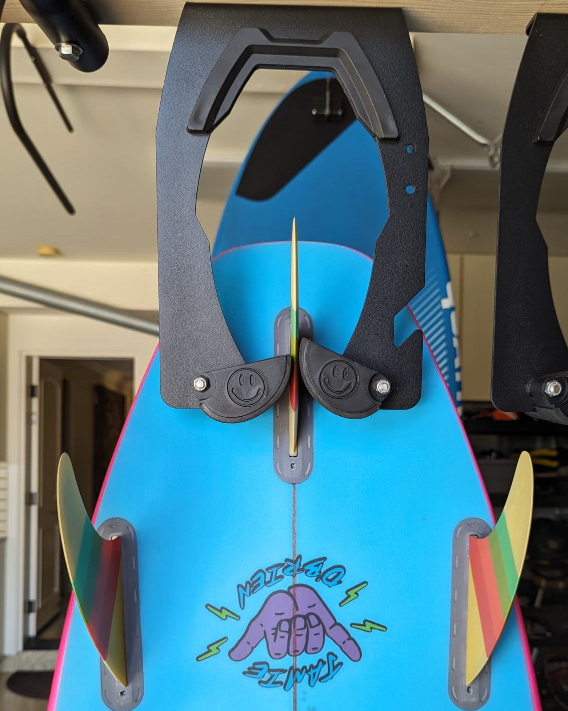 Smile-Grabber Sport Rack holding a surfboard